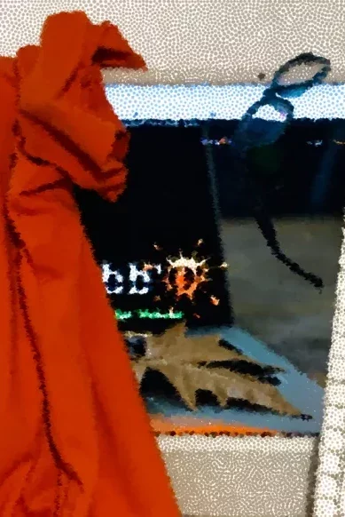 Image of a MAC M1 with a keyboard and a shirt